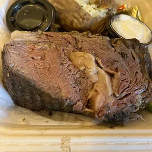 20 oz Prime Rib with a vegetable side and potato. Great sized tender cut! Great flavor
