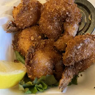 Large plump crispy shrimp. Orange sauce for dipping.