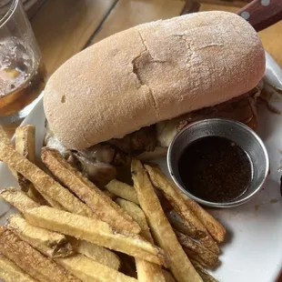 Shaved sirloin sandwich with fries