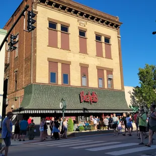 people walking across the street