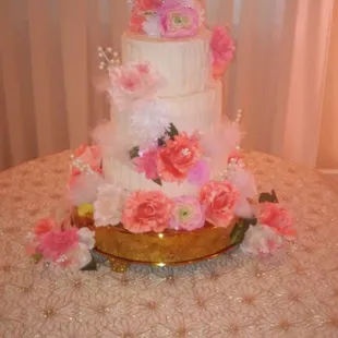a three - tiered wedding cake