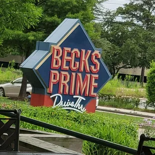 the back of a sign for becks prime