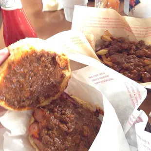 Chili cheese dog burger and fries.