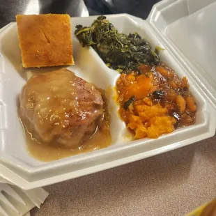 Hamburger steak, yams and turnip greens