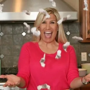 Our founder, Becky, surrounded by her delicious caramels!