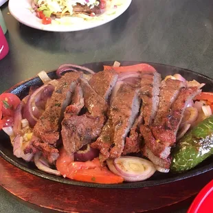 Carne asada plate. Came with rice, beans, fresh avocado slices and pick de Gallo.