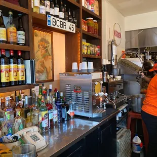 a woman working in a restaurant kitchen