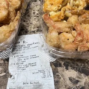 two containers of fried shrimp and green beans