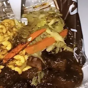 Oxtail Platter (with Mac &amp; Cheese and Cabbage). Swimming in oxtail gravy. Blessed!