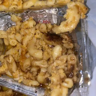 Oxtail not cleaned.  Mac and cheese drenched in oxtail grace and oil