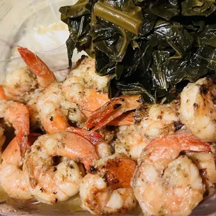 Grilled shrimp with collard greens. There should have been Cole slaw included but it wasn't in the order.