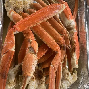 BOGO Crab Legs combined into one tray. 1 tray comes with 1 full cluster each and 2-3 individual legs.