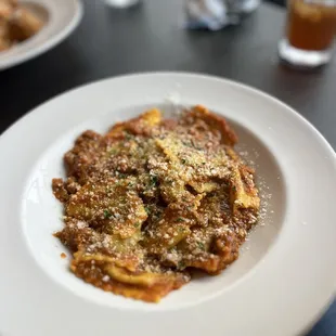Ravioli over Bolognese sauce