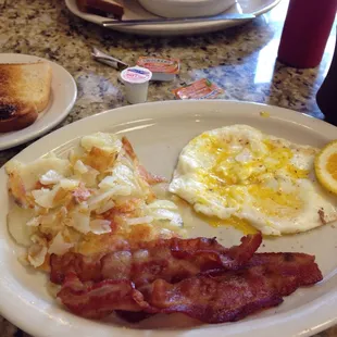 House special partly eaten and in the back was the Greek skillet was also excellent.