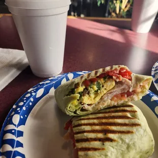 Chai tea latte with cinnamon and a Good to Go breakfast wrap with spinach and extra peppers