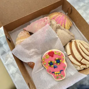 a box of sugar skull cookies