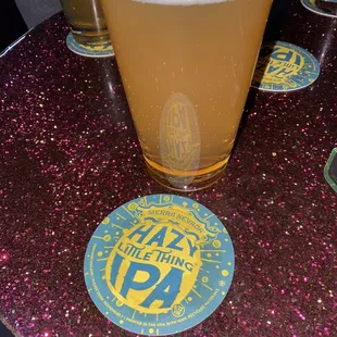 a pint of beer on a table