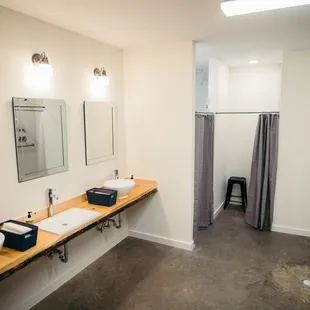 Men's and Women's locker rooms complete with multiple showers and adjoining changing rooms.