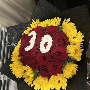 Happy anniversary and Happy birthday arrangement red roses and sunflower