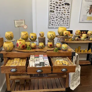 a display of honey jars and other items