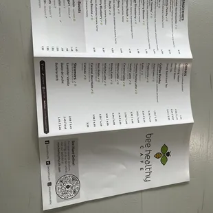 a menu attached to a refrigerator