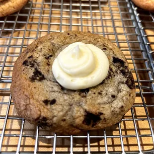 C.R.E.A.M! Double stuffed Oreo based cookie w/ cream cheese frosting.