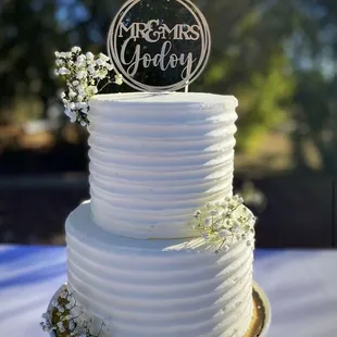 Wedding cake with a custom cake topper