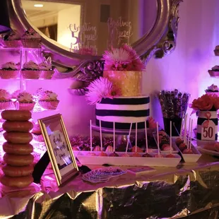 50th  Birthday display! Beautiful cake,decorated donuts, delicious cake pops. Set up was perfect!