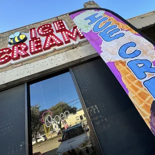 the reflection of a sign in the window