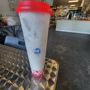 Weird angle but this is super good. Coconut with bursting strawberry boba.