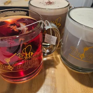 two mugs of tea and a mug of coffee