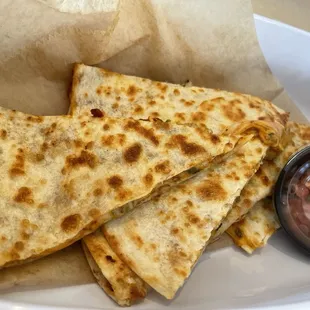 Chicken quesadillas with guacamole and pico de gallo and sour cream