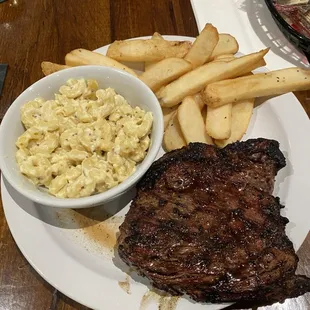 Steak with fries and mac and cheese