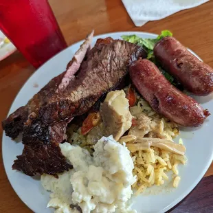 Brisket, Pork Sausages, Fish curry, mash potatoes, just one example plate!