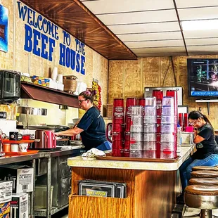 two people sitting at the counter
