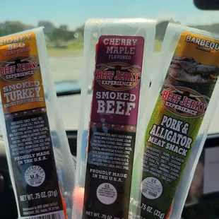 three packages of beef jerky