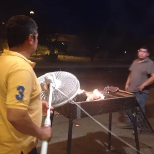 Fanning the charcoal