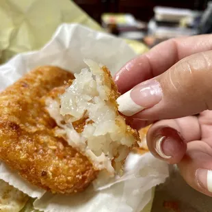 Hash browns. Pretty good. Fried fresh. Though very oily.