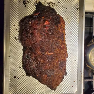 Brisket.  Insanely moist.  Not worth spending less for the amount of time, care and effort I'm investing for the final product.