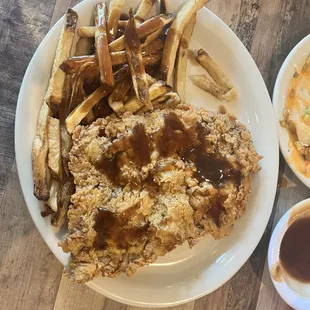 Chicken fried steak and french fries