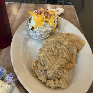 Small chicken fried steak no gravy requested.
