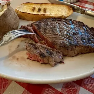 Steak, potato, and bread