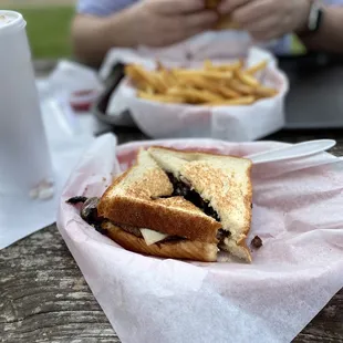 Mushroom Swiss Burger on Texas toast and a small basket of fries. (I cut the burger prior to taking the photo)