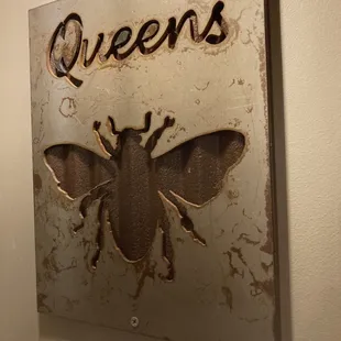 Cute signs point the way to the bathrooms