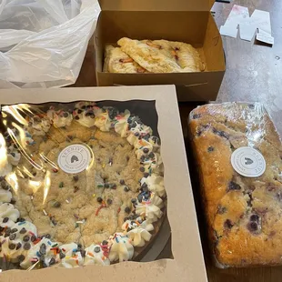 Celebration cookie, lemon blueberry bread, and peach scones.
