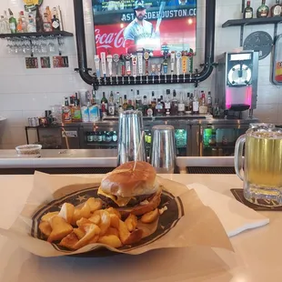 Lunch burger  $9 + $.99 draft beer