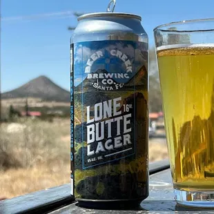 a can and a glass of beer