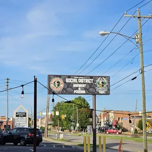 a sign on the corner of a street