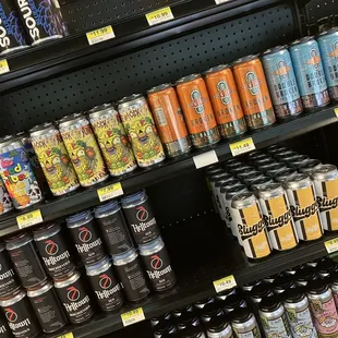 a variety of beverages on a shelf