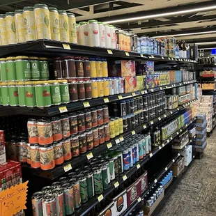 a variety of beverages in a grocery store